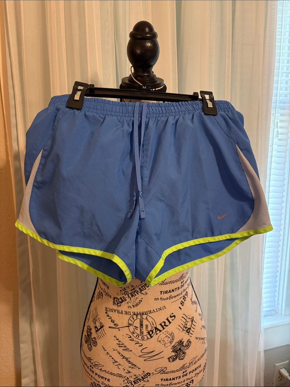 Nike Women’s Light Blue Athletic Shorts with Neon Yellow Trim